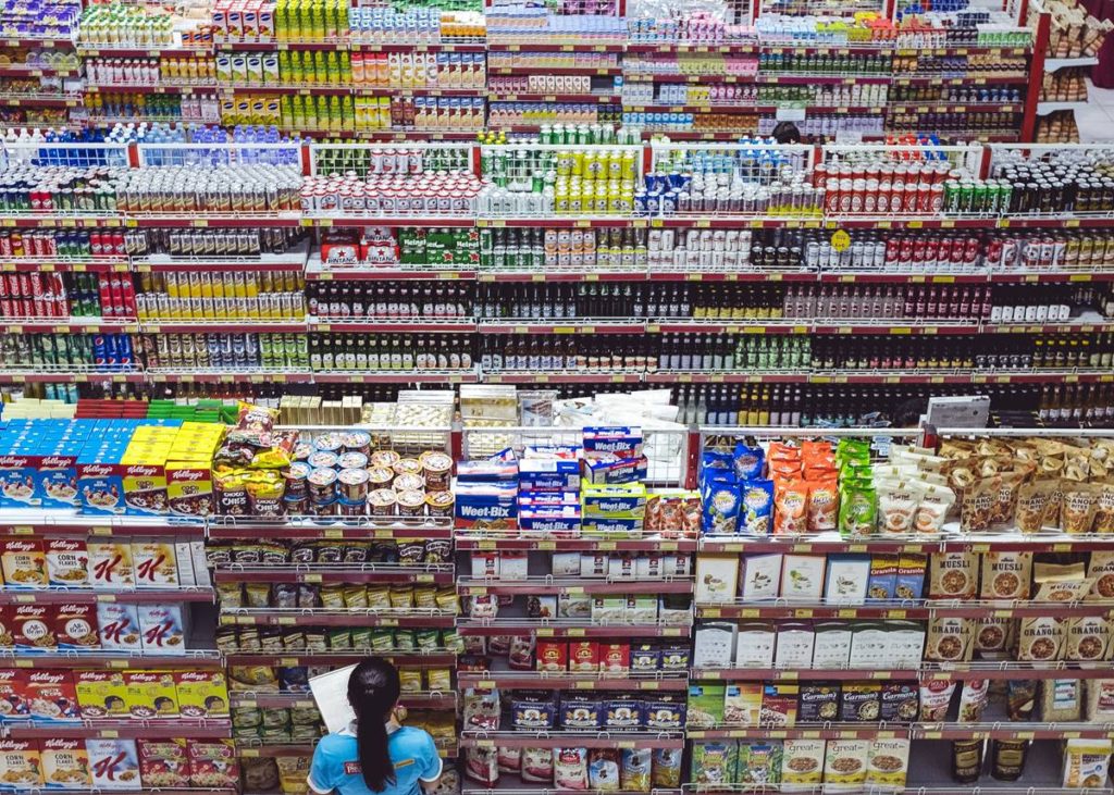 Mass consumption: stocked supermarket shelves